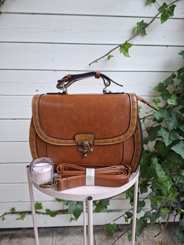 Banned Stevie Handbag
🧡